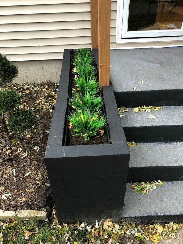 Brick Planter In Front Of House